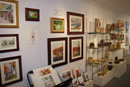 Interior shot of the Artists' Undertaking showing available art and pottery